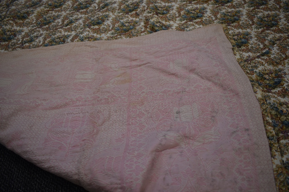 A vintage bed throw, floral to one side and pink and wool woven fabric to reverse. - Image 3 of 3