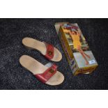 A pair of retro Scholl exercise sandal in box, box states size 5.