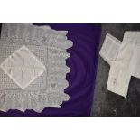 A small collection of vintage table linen including table cloth with deep crotchet to edge.