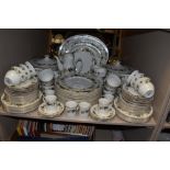 A Royal Doulton Larchmont part dinner service including dinner plates,side plates,cups and saucers,