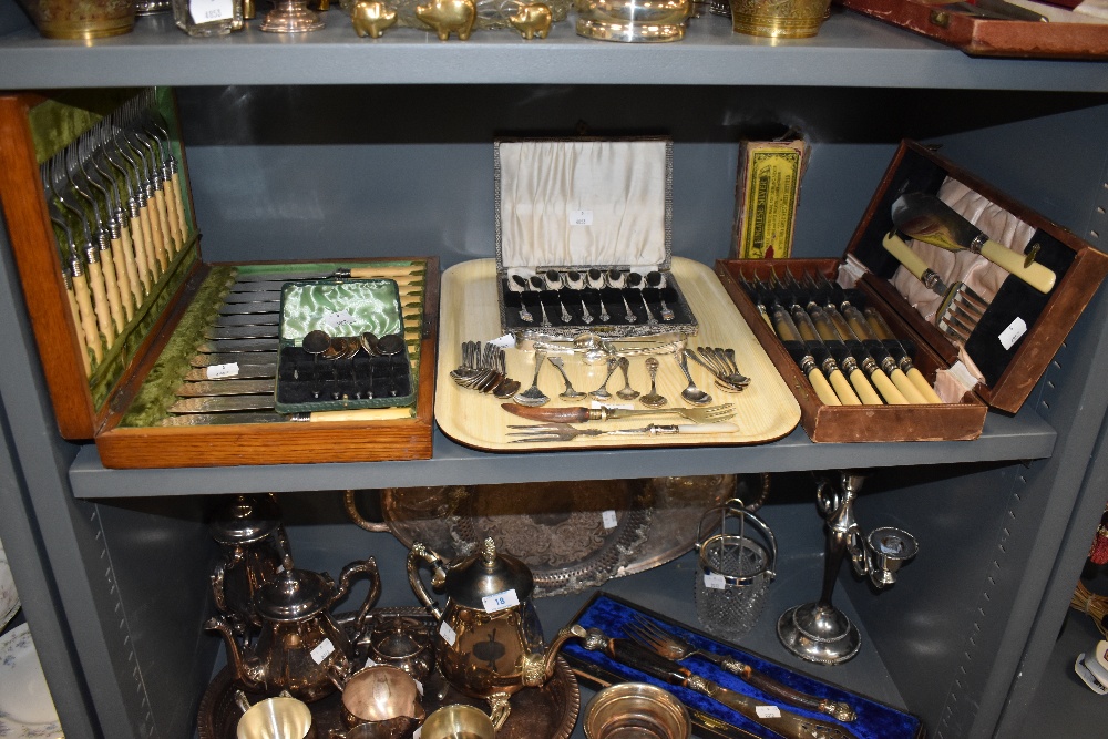 A variety of cutlery including canteen of fish knives and forks, sugar nips, boxed spoons and more.