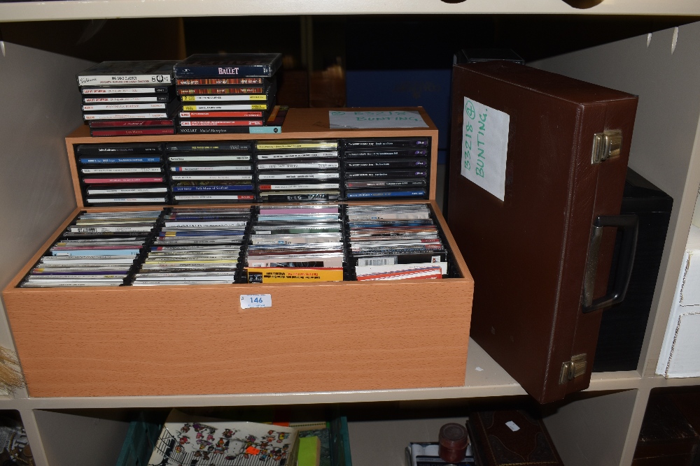 Two compact disc units with Jazz related compact disc and cassette collection.