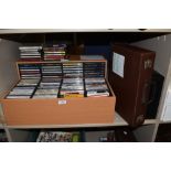 Two compact disc units with Jazz related compact disc and cassette collection.