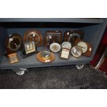A selection of early plastic and Art Deco styled mantle alarm and travel clocks including Temco ,