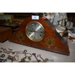 A mantle clock having transfer design and serpentine design