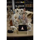 A mixed lot of ceramics including a pair of Staffordshire dogs,an assortment of Lladro figurines and