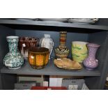 A selection of planters and vases, various styles and eras.