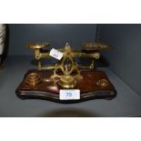 A set of antique postal or letter scales with assortment of weights