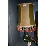 A vintage glass table lamp with shade.