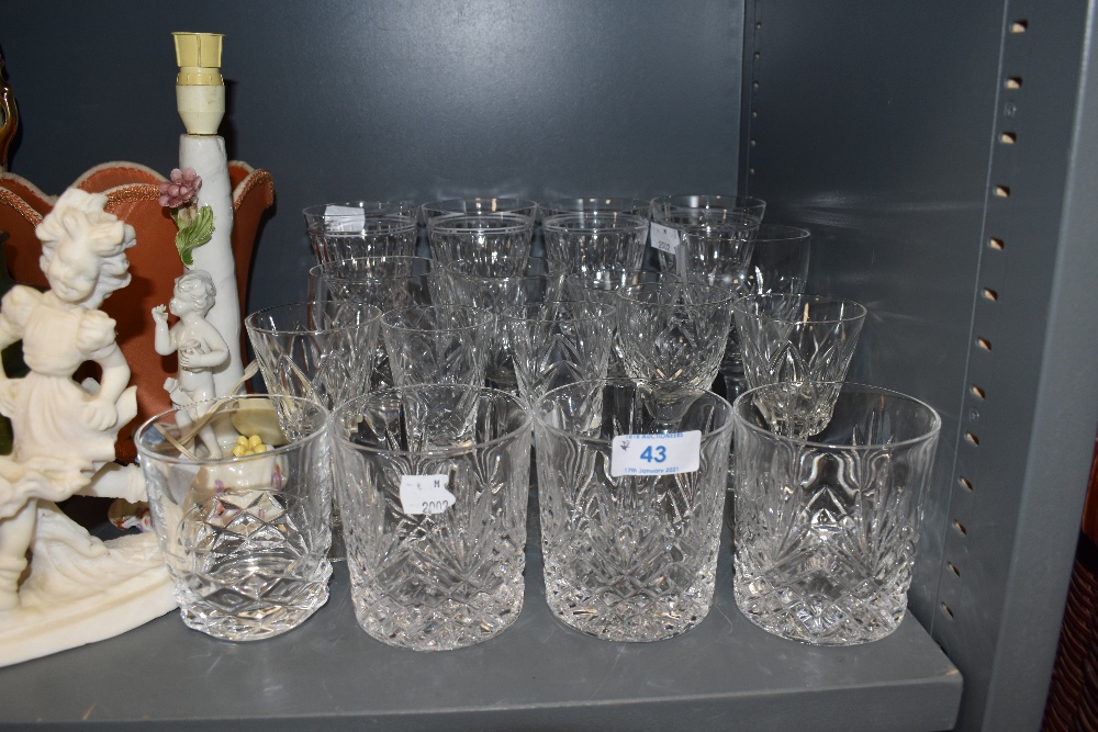 A selection of moulded drinks glasses,including wine glasses and tumblers.