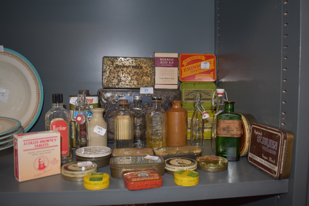 A collection of vintage tins,chemist/medicine bottles and similar.