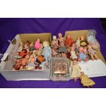 A collection of Kewpie style celluloid dolls, most made in Japan, various sizes but mainly small,
