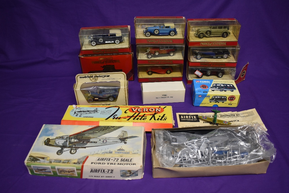 A Airfix 1:72 scale plastic kit, Ford Tri-Motor, part made, a Veron Tru Flite wooden kit, Harvard,