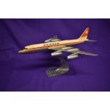 A Professional desk top diecast Swissair passenger aircraft model, on aluminium stand,