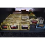 A collection of 46 Matchbox Models of Yesteryear diecast vehicles all in yellow, white, blue and