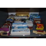 A shelf of modern diecasts including Corgi Austin Metro 275, Corgi Transport of the 30's Bryant &