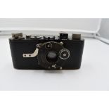 An extraordinarily rare Leica 1B Dial-Set Campur camera in leather case Circa 1927. Serial No 6001