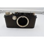 A Leica 1F camera body in leather case Circa 1933. Serial No 109925