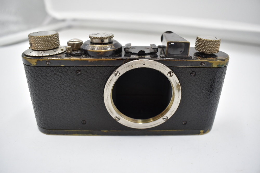 A Leica 1C camera body in leather case Circa 1931. Serial No 64481