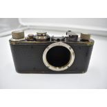 A Leica 1C camera body in leather case Circa 1931. Serial No 64481