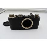 A Leica 1E camera body in leather case Circa 1932. Serial No 104542