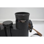 A pair of Leica Trinovid 10 x 40 binoculars. Serial No 784751 in original case