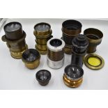 A selection of nine predominantly brass lenses including Ross, R & J Beck and de Maria, Paris