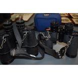 Two pairs of binoculars Greenkat 10 x50, Swift Grand Prix Mk1