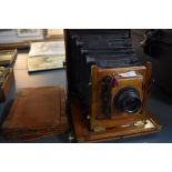 A Mahogany cased field camera by R & H Robbins, Exchange Street Liverpool with a Ross lens and