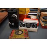 A Dekko cine camera in original box, a pair of pocket binoculars in original box etc SELLING IN