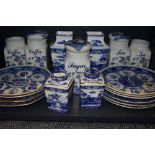 A selection of blue and white wear ceramics including Ringtons vase and caddy pairs