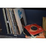 A selection of vinyl albums and singles including The Beatles interest