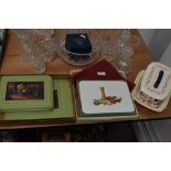 A selection of boxed mid century place mats including melamine,a box of colourful vinatge napkins