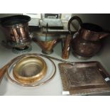 An assortment of copper items including large jug, horn,bowl and ice bucket.
