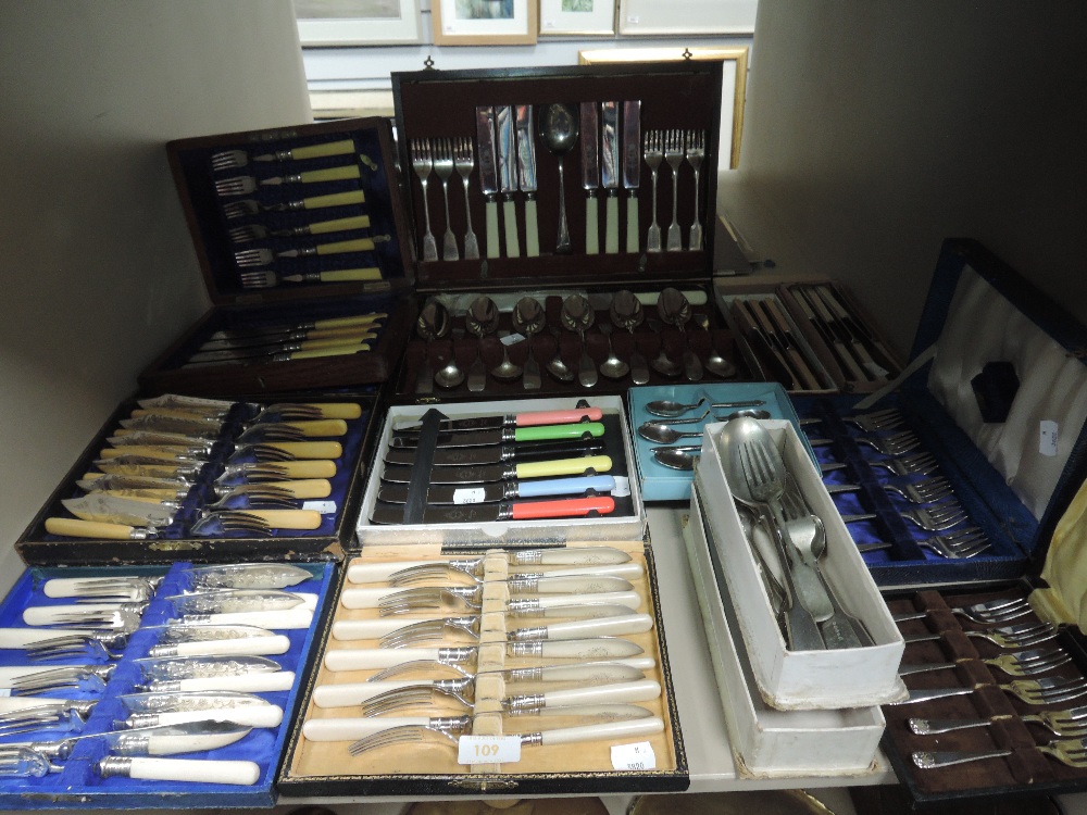 A large lot of mixed vintage and antique boxed cutlery sets and canteen including cake forks, fish