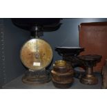 Two sets of antique kitchen weighing scales including Salters Family scale and similar