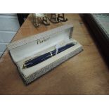 A vintage navy blue Parker Slimfold 6 fountain pen having Single decorative band to cap with