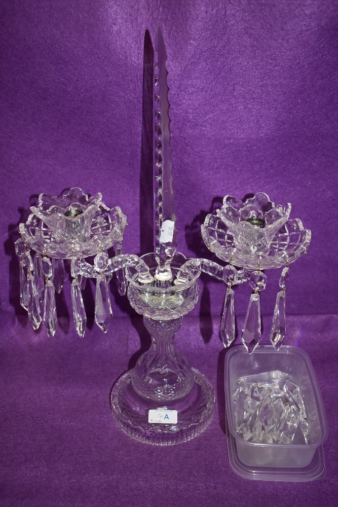 A clear cut crystal Waterford glass candelabra possibly in the Lismore or Irish design having in