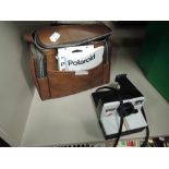 A vintage Polaroid land camera 1000 with red button, Polaroid case , warranty voucher for SX-70 film