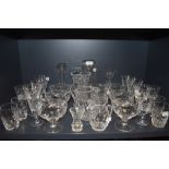 A selection of clear cut and crystal glass wares including Stuart footed bowls and tumblers