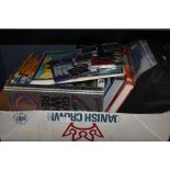 A selection of collectable coins and currency also car seat cover set and selection of Disney books