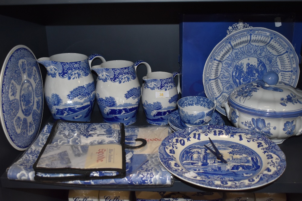 A selection of blue and white wear ceramics including graduated Spode jugs having black back stamp