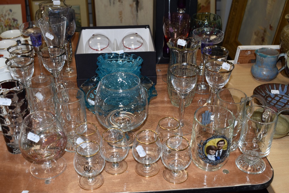 A selection of glass wares including wine and decanter also 1950's pressed aqua blue dish set