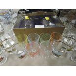 A set of commemorative golden jubilee glasses in box, a variety of mid century shot glasses also
