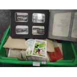 A box full of varied vintage ephemera including photographs, postcards,greetings cards and more,