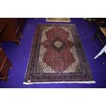 A Persian sorouk rug, 100% wool pile, approx. 160 x 103cm