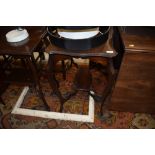 An Edwardian mahogany occasional table, shaped top approx. 74 x 42cm, damage to one corner