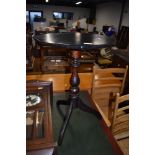 A traditional stained frame octagonal top occasional table