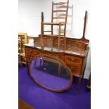 An Edwardian mahogany and inlaid dressing table , labelled for Maple and Co