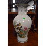 A reproduction Oriental vase, nice decorators piece, height approx 36cm some cracking to the neck